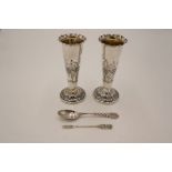 A pair of Victorian silver Elkington and Co Ltd vases having scalloped design rim, raised circular b