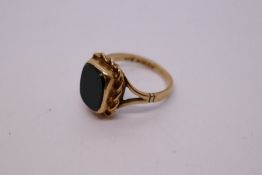 9ct yellow gold signet ring with black rectangular panel with a gold rope twist frame on split shoul