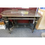 A 19th Century French brass inlaid and ebonised centre table having shaped stretcher on fluted legs