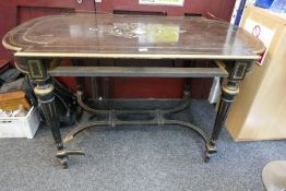A 19th Century French brass inlaid and ebonised centre table having shaped stretcher on fluted legs