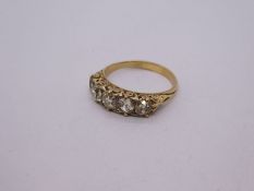 Antique unmarked yellow gold 5 stone diamond ring, the largest approx 0.3 carat, set in a pierced fl