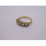 Antique unmarked yellow gold 5 stone diamond ring, the largest approx 0.3 carat, set in a pierced fl