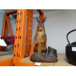 A Bavarian carved figure depicting wooden Hare, with hinged top, possibly Tobacco jar