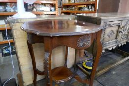 An old mahogany two tier occasional table