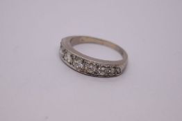 18ct white gold half eternity ring set 7 graduating brilliant cut diamonds, chanel set, marked 18ct,