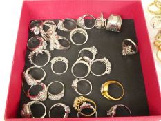 Tray of modern silver and other dress rings, some set with diamond chips, etc