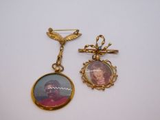 Two gilt metal brooches suspended with circular fob lockets