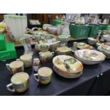 A large quantity of Royal Doulton Dickens-ware, to include a jardinière three piece tea set and a si