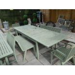 Large 9'11" table with two bench style, three seater chairs and two carvers
