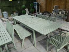 Large 9'11" table with two bench style, three seater chairs and two carvers