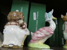 A pair of large Royal Daulton Beatrix potter figures of Jemima Puddle-duck and Mrs Tiggy-Winkle limi