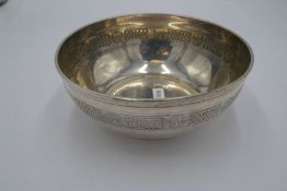 A silver Continental circular bowl with embossed border design on the body. Marked 800 on the base.