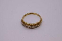 Vintage 18ct yellow gold two tone ring with seven chanel set diamond chips on textured mount, Birmi