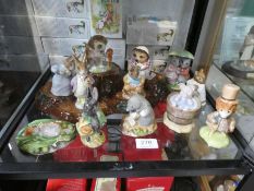 Twelve Beswick Beatrix Potter figures and a Beswick tree stamp stand (mainly boxed)