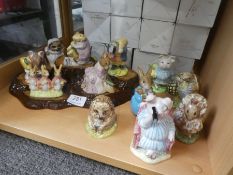 Twelve Beswick Beatrix Potter figures and a Beswick tree stump stand. (figures all boxed)