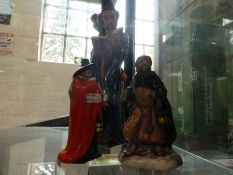 A Royal Doulton figure of The Wizard HN2877 and two small figures of Guy Fawkes and Good King Wences