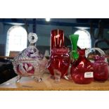 A selection of cranberry glass and a selection of other colours, mostly vases and jugs