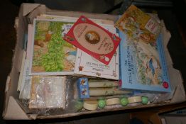 Two boxes of Peter Rabbit, books, puzzles, tins and games
