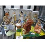 A selection of twelve Beswick Beatrix Potter figurines to include Squirrel Nutkin, (silver back stam