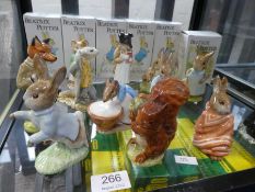 A selection of twelve Beswick Beatrix Potter figurines to include Squirrel Nutkin, (silver back stam