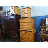 Two modern pine chest of drawers an a pair of matching bedside chest