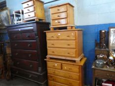 Two modern pine chest of drawers an a pair of matching bedside chest