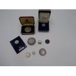 George III Silver Crown, 1887 Victoria silver double florin in white metal brooch mount, and a selec