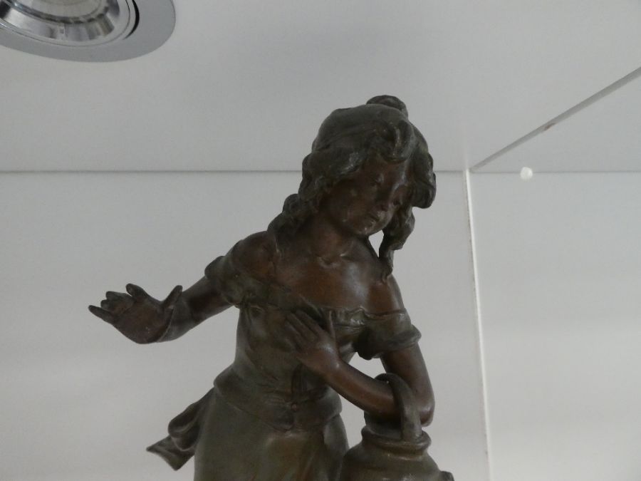 An antique French figural clock having spelter lady holding bucket with gilt metal and onyx base, 62 - Image 4 of 6