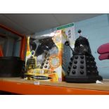 A radio controlled Dalek by character boxed and two other unboxed examples