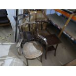 Three vintage Thonet style chairs and a small table
