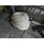 Large coil of white synthetic rope