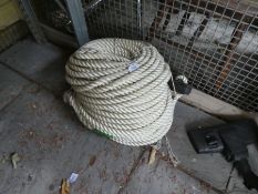 Large coil of white synthetic rope