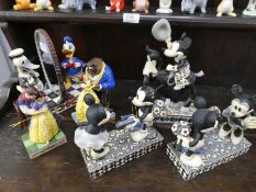 Six Enesco Walt Disney Showcase Collection figures including Mickey Mouse and Donald Duck, boxed