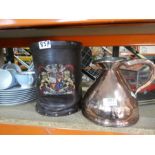 A vintage copper jug and a reproduction black powder carrier