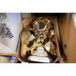 A box of cherub related items, wall plaques, brackets etc