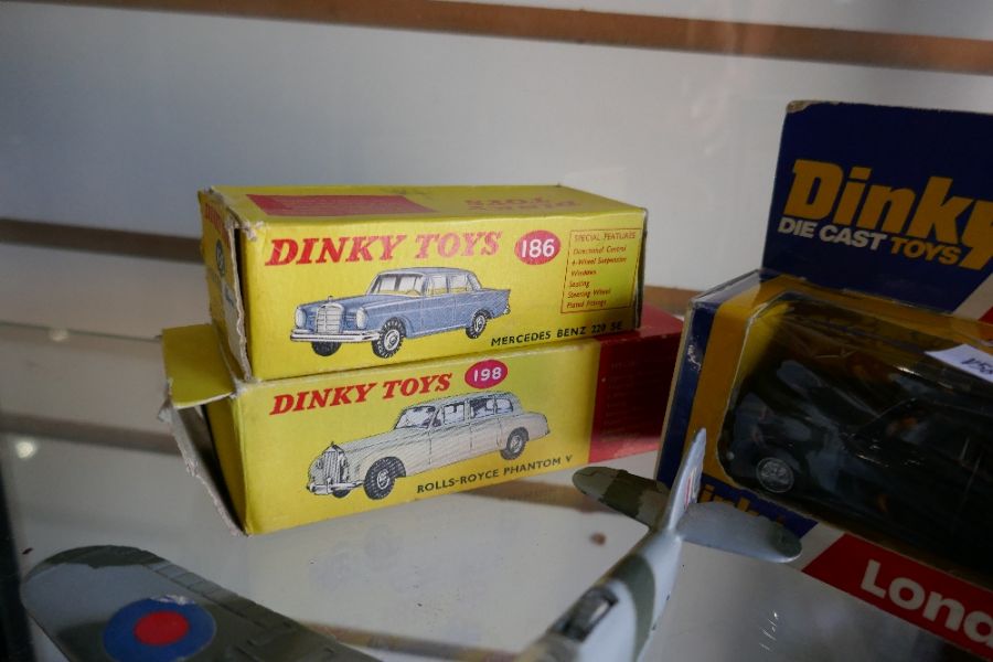 A selection of Dinky toys No 186 and 198, a taxi and 2 WWII aircraft - Image 3 of 4