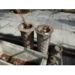 Two column style, reconstituted ground stone planters, manufactured by Haddonstone