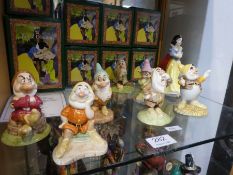 A Royal Doulton limited edition set of Snow White and the seven Dwarfs 769/2000, boxed, with certifi