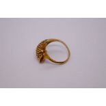 14ct yellow gold dolphin ring, the head and tail crossing over at the front, marked 585, size O/N, 4