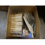 A box of postcards on various subjects