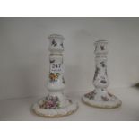 Pair of Dresden style floral candlesticks with gilt decoration