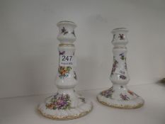 Pair of Dresden style floral candlesticks with gilt decoration