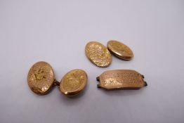 Pair of 9ct floral engraved cufflinks, JA & S, Aitkin & Son, Birmingham, and a 9ct panel off of an I