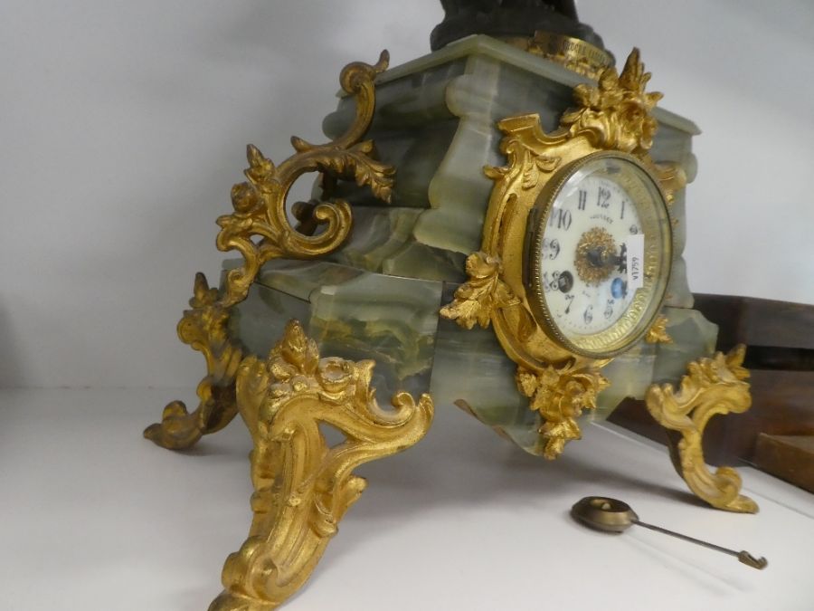 An antique French figural clock having spelter lady holding bucket with gilt metal and onyx base, 62 - Image 5 of 6