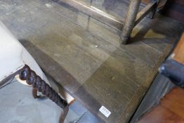 An antique oak oblong table having one drawer on square tapered legs, 192cms