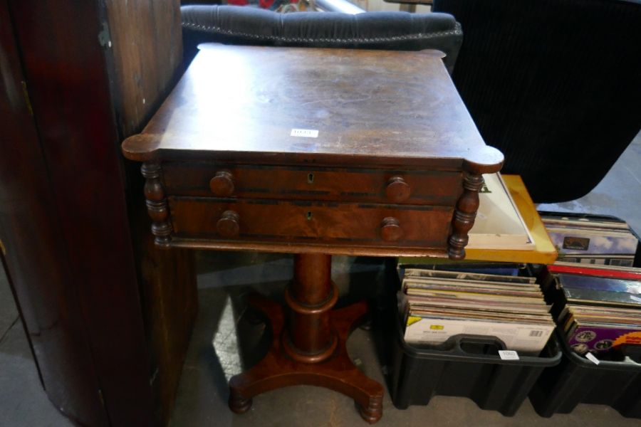 An antique mahogany 2 drawer work table on turned pillar