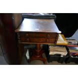 An antique mahogany 2 drawer work table on turned pillar