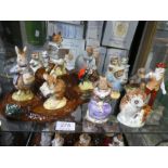 Nine Royal Albert Beatrix Potter figures, a Beswick tree stump stand and three Beswick figures (main