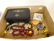 Tray of vintage costume jewellery to include red (possibly amber) beads, silver, marcasite and ename