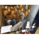 A Beswick Lion and a quantity of Royal Doulton cats to include a limited edition of 'The Walking Cat
